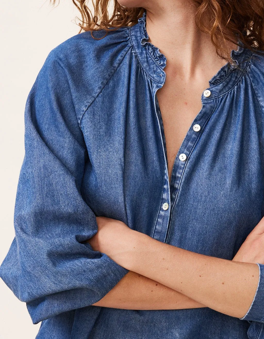 unsubscribed cotton chambray ruffle blouse